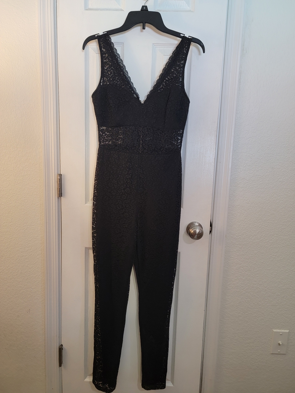 bebe Black Lace V-Neck Jumpsuit with Sheer Waist Panel